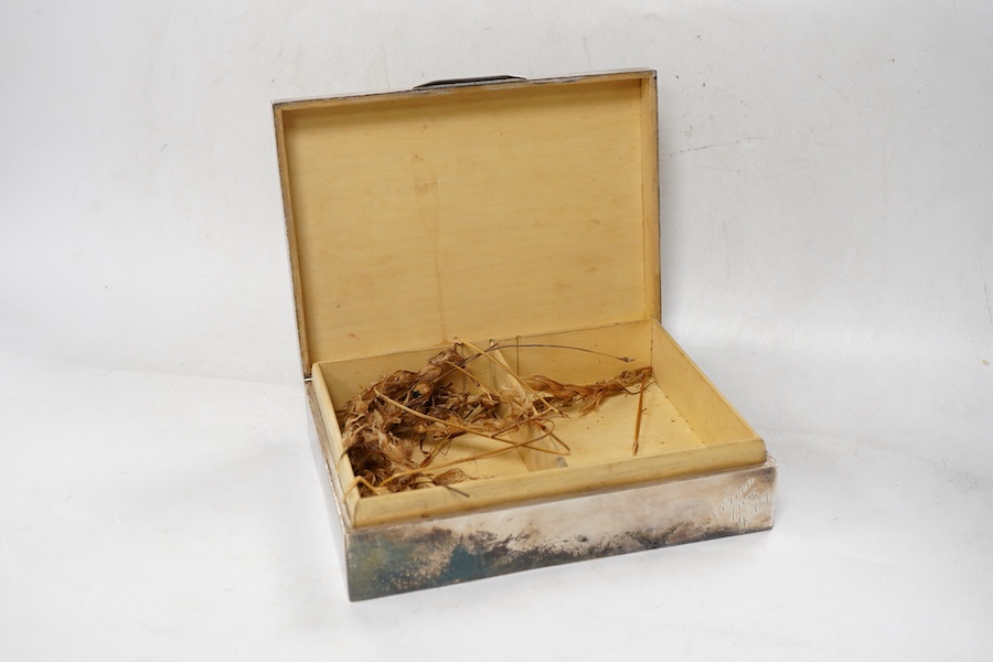 A George V silver mounted rectangular cigarette box, Sampson Mordan & Co, London, 1931, 17cm, with engraved monogram to the cover.